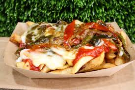 Marty's V Burger signature dishes Cajun Cheezy Pepper Steak
Mona Lisa
Cheeze Fries